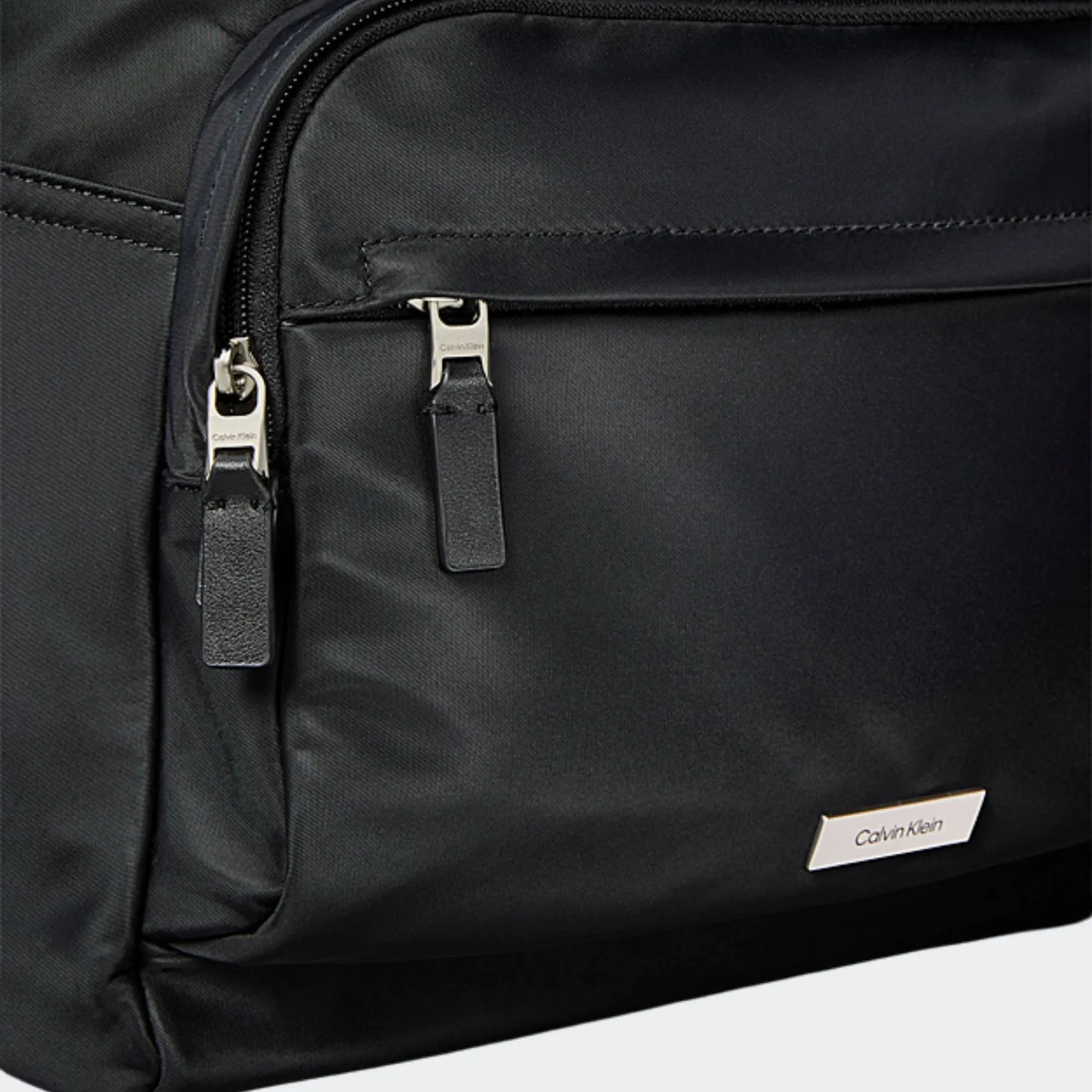 CALVIN KLEIN JEANS SLEEK ROUND BACKPACK