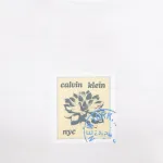 CALVIN KLEIN JEANS TRAVEL STAMP GRAPHIC TEE