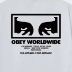 OBEY THE MEDIUM IS THE MESSAGE TEE