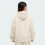 PUMA ESSENTIALS TAPE RELAXED HOODIE GIRLS